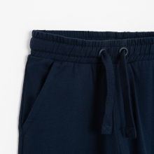                             Jednobarevné teplákové kalhoty -tmavě modré                        